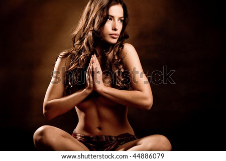 beautiful woman in yoga position, studio shot