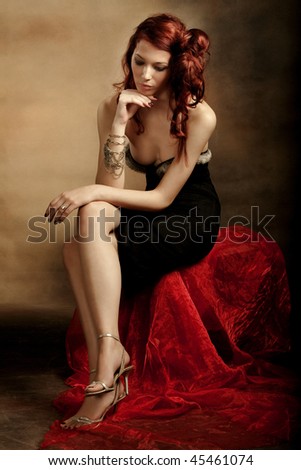 elegant red hair woman, studio shot