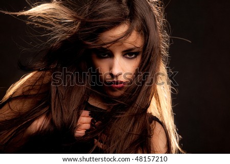 young brunette woman, flying hair