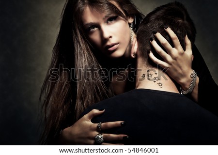 stock photo young woman and man with tattoo on neck