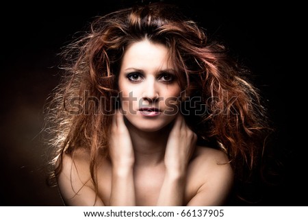 red hair beautiful woman portrait, studio shot dark background