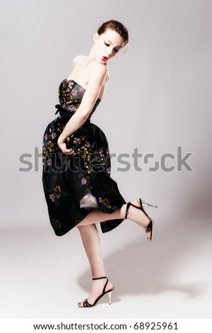 stock photo young woman in elegant high fashion dress studio shot 