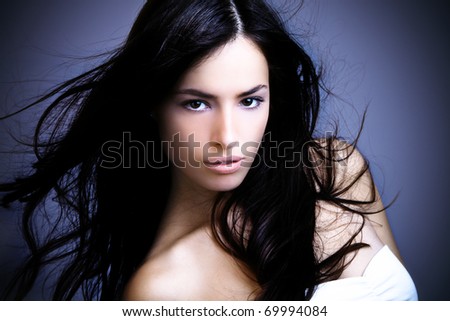 black hair beautiful young woman portrait, studio shot