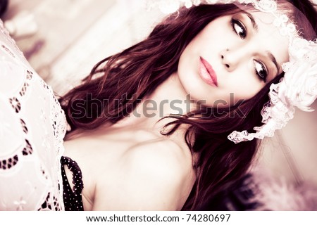 young sensual woman portrait indoor shot