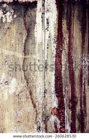 natural wood background with worn and cracked paint aged by time