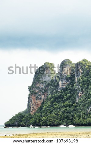 RAILAY travel steep cliffs. A popular tourist climb the cliff. Krabi Thailand.