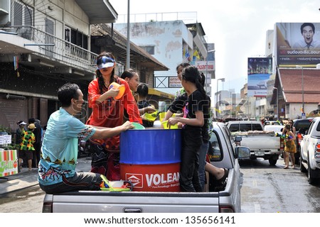 CHIANG MAI THAILAND-APRIL 13:Chiangmai Songkran festival.People were left out private cars to attend the festival.on April 13,2013 in Chiangmai,Thailand.