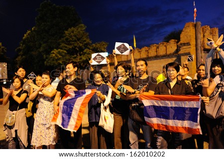 CHIANG MAI THAILAND-NOVEMBER 8 : No Amnesty Bill. Unidentified women holding signs protest the government at Tha Pae Gate. on November 8,2013 in Chiangmai,Thailand