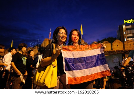 CHIANG MAI THAILAND-NOVEMBER 8 : No Amnesty Bill. Unidentified women holding signs protest the government at Tha Pae Gate. on November 8,2013 in Chiangmai,Thailand