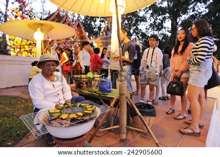CHIANG MAI THAILAND - DECEMBER 26 : Ancient market walking street, Popular tourist food and visit the local fruit market is be held everyday. on December 26, 2014 in Chiang Mai, Thailand.