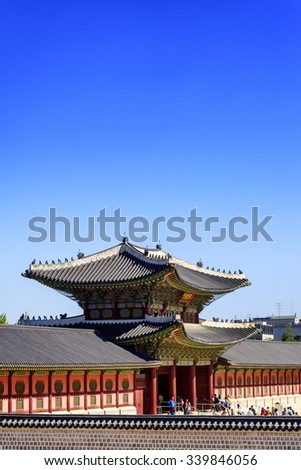 SEOUL, KOREA - OCTOBER 9, 2015 : Gyeongbokgung Palace, place of historical importance and most popular tourist attraction where tourists come to visit the elegant architectural magnificent.