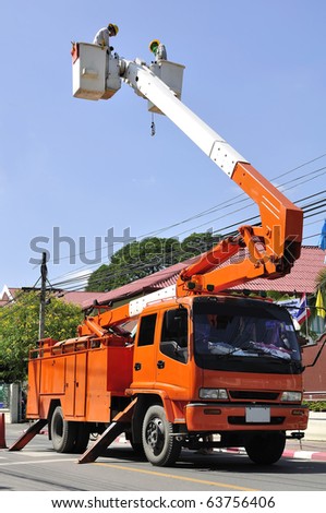 Truck electric service People working in the electricity from Thailand