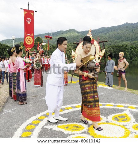 CHIANGMAI,THAILAND-JULY 7:The wai khru ceremony.Female Thai traditional costume parade. To pay homage to sacred ceremonies are held annually on July 7,2011 in Chiangmai university, Thailand.
