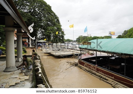 CHIANG MAI THAILAND - SEPTEMBER 28 : Flooding the Chiangmai city.Flooded houses near the river and damage significantly on September 28,2011 in Chiangmai Thailand