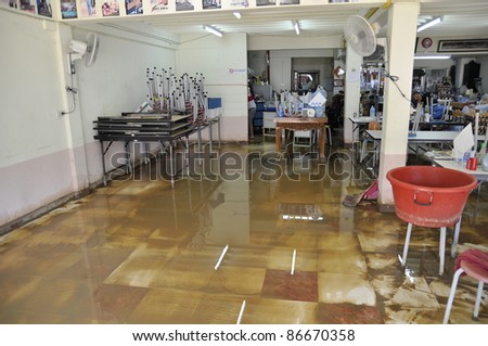 CHIANG MAI THAILAND - SEPTEMBER 29 : Flooding the Chiangmai city.Flood damage over a wide area stores on September 29,2011 in Chiangmai,Thailand