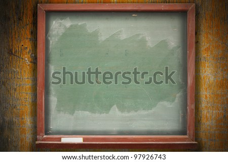 Board on desk wood background education concept