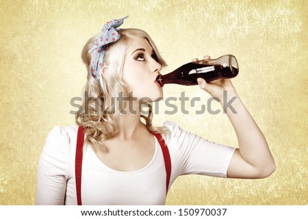 Beautiful blond pinup girl drinking soda drink at vintage sweets shop