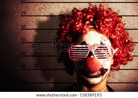 Grunge Portrait Of A Funny Clown Criminal Getting Mug Shot Id Photo On Police Lines
