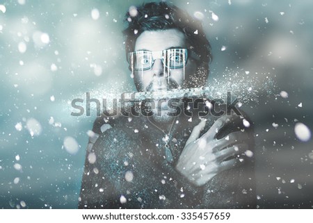 Ice cold winter art of a man holding explosive thermometer in shivering jaw while in a freeze of snow and frost from a blizzard of falling white ice. Temperature below freezing