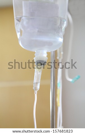 Infusion bottle with IV solution in hospital
