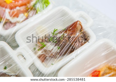 Canape ; Decoration and foods that are wrapped with plastic wrap prepared for the wedding
