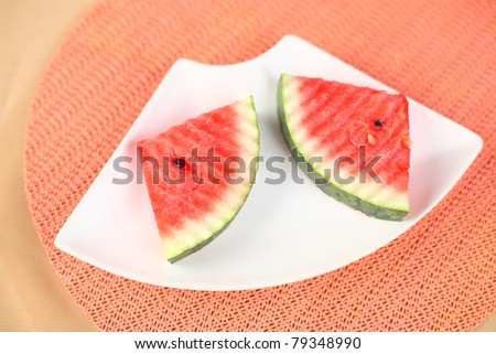 Fresh watermelon pieces on a plate