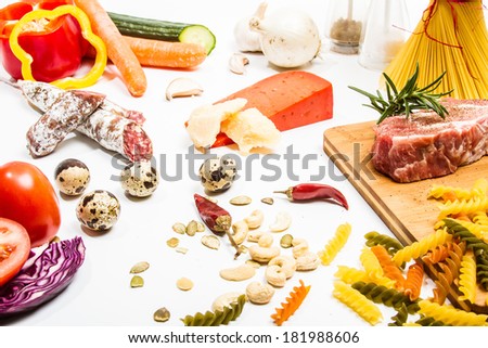 Food ingredients scattered around the white background. Isolated with light shadow.