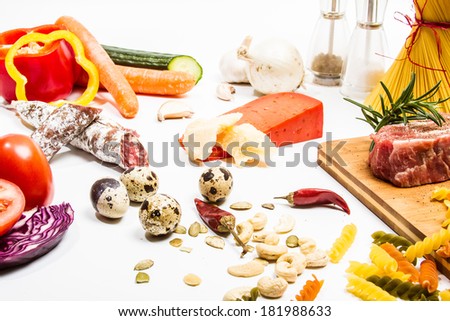 Food ingredients scattered around the white background. Isolated with light shadow.