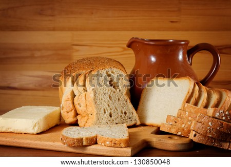 rustical still life with bread, butter and jam