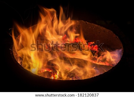 fire in the round fireplace
