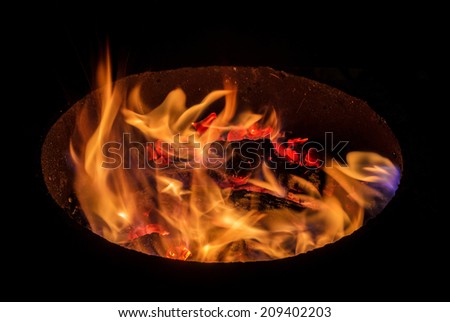 burning fire in the round oven