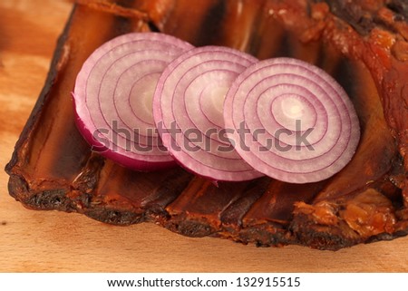 Red meat with red onion slices