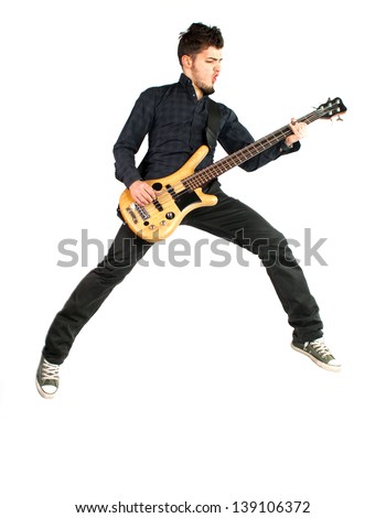 Jumping bass player on a white background
