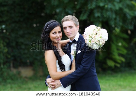 Beautiful wedding couple in the park