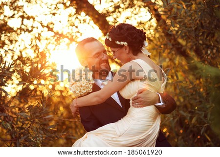 Bride and groom in a beautiful light