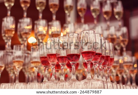 Wedding glasses filled with wine and champagne