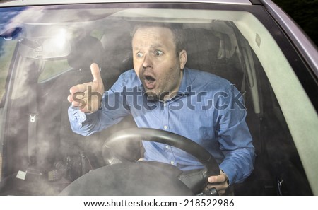 Angry driver yelling on some other driver during driving