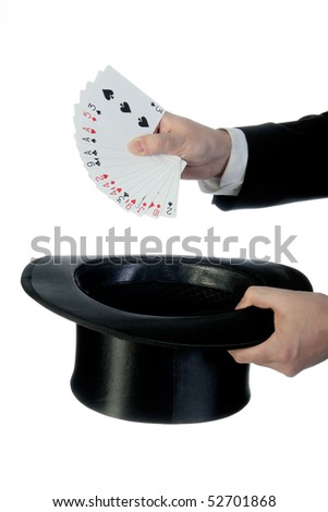 Magician make performance with card deck and top-hat