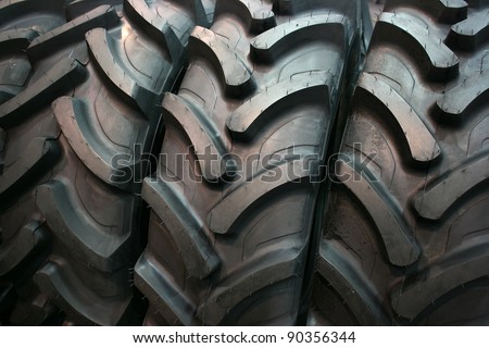 Brand new tractor tires placed on factory floor ready to be transported to tiers shop