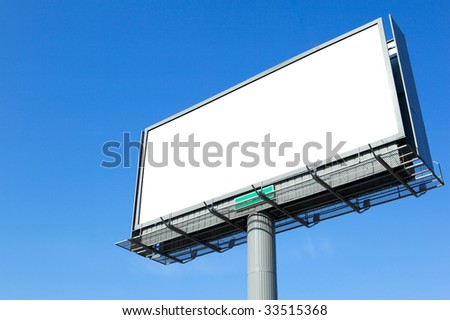 Blank billboard on a clear blue sky.