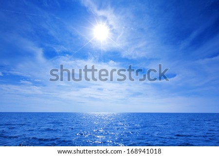Sun, beautiful sky and blue ocean