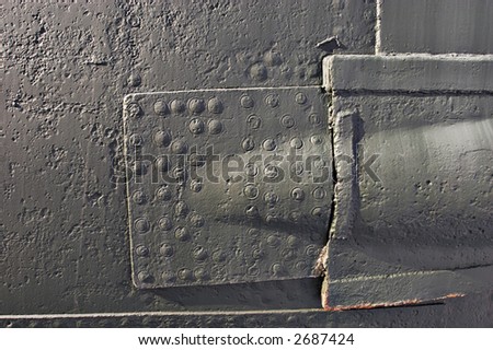 Fragment of a board of an old submarine