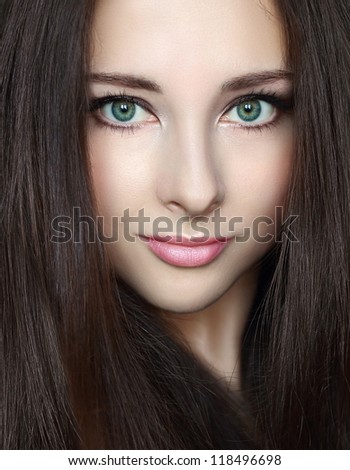 Beauty woman with perfect natural makeup and smooth healthy hair. Close portrait