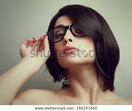 Sexy short hair woman in glasses. Closeup vintage portrait