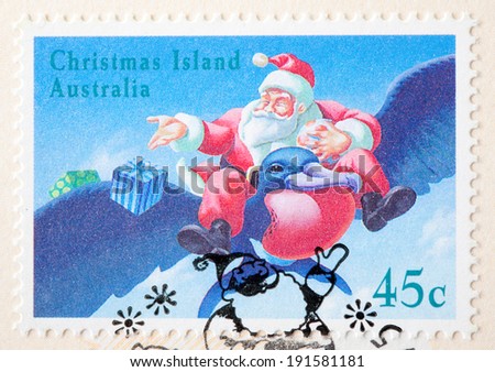 CHRISTMAS ISLANDS - CIRCA 1995:A Cancelled postage stamp from Christmas Islands illustrating Santa delivering presents, issued in 1995.