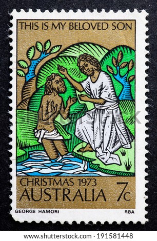 AUSTRALIA - CIRCA 1973:A Cancelled postage stamp from Australia illustrating John Baptising Jesus, issued for Christmas 1973.