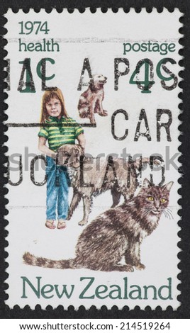NEW ZEALAND - CIRCA 1974: A Cancelled postage stamp from New Zealand illustrating Childrens Pets, issued in 1974.