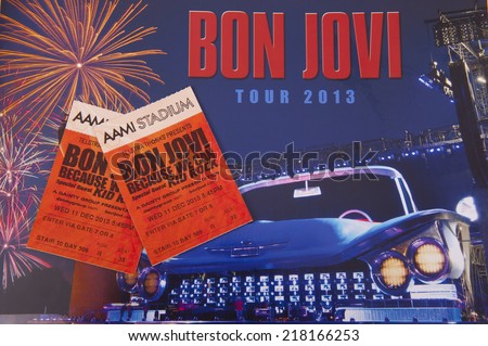 Adelaide, Australia - December 12, 2013: A studio shot of a Tour guide and tickets from Bon Jovi\'s 2013 World Tour. Bon Jovi spent 2013 touring and performing concerts throughout the world.