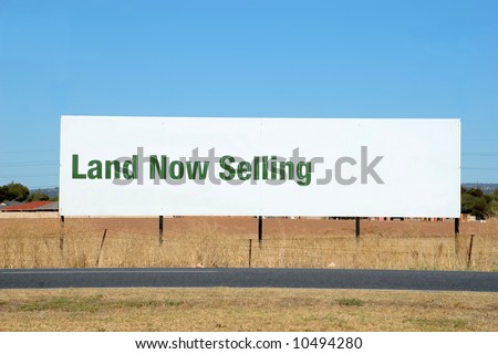 Large Roadside Billboard advising of land for sale