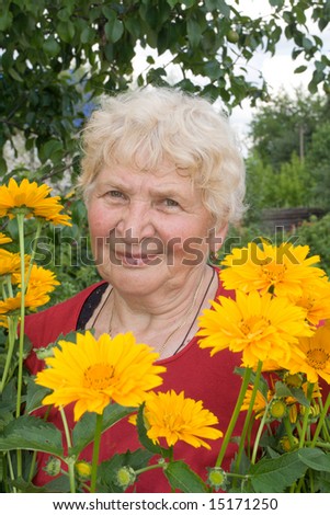 Grandmother staying in the flower garden